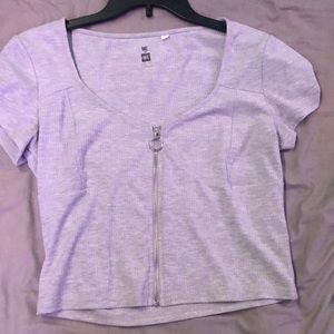 Grey low tshirt, with zippered front that goes all the way up and down